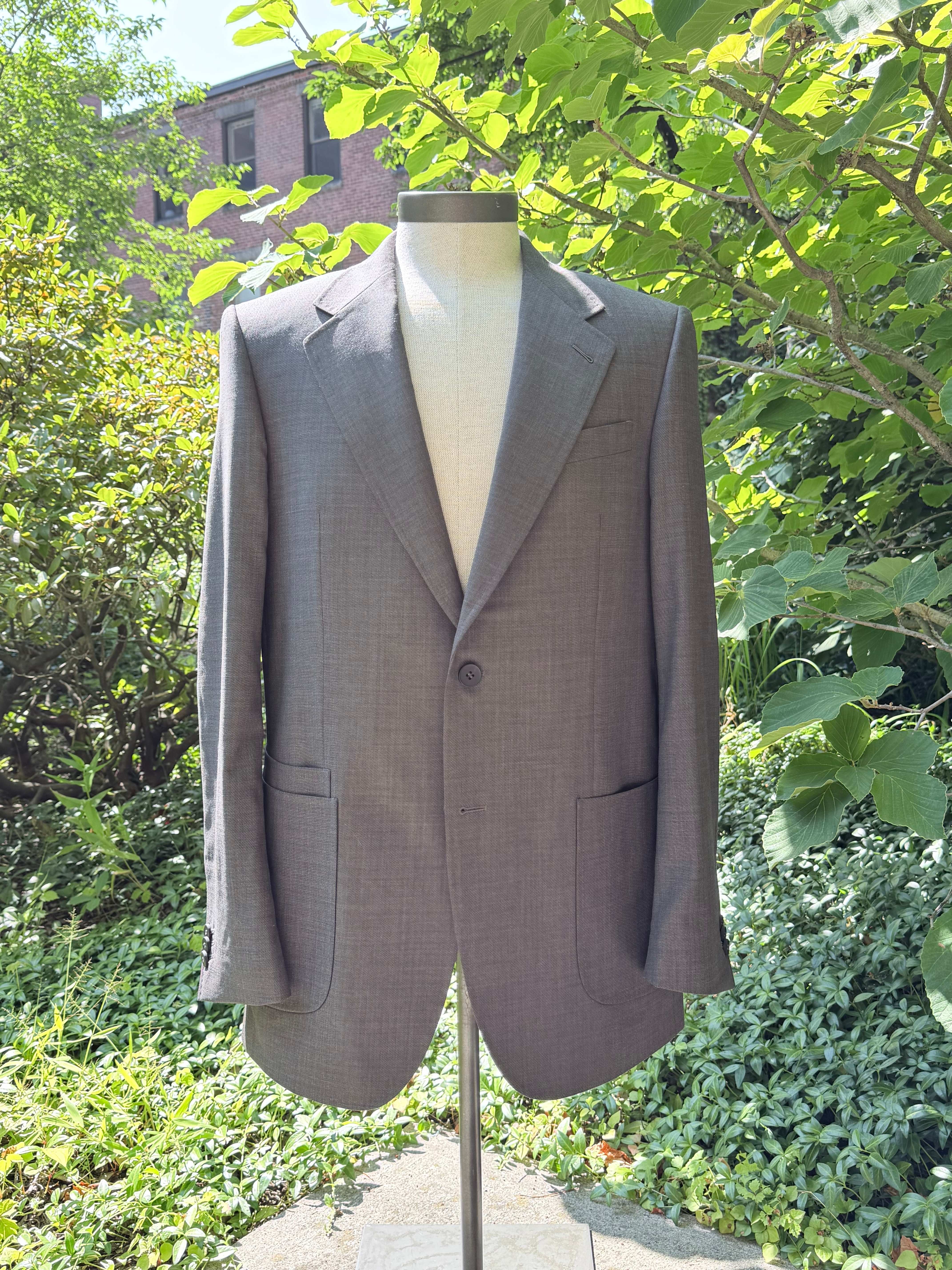 Taupe single-breasted notch-lapel blazer on a form